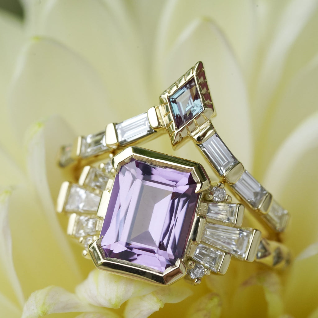 custom art deco engagement ring with emerald cut center