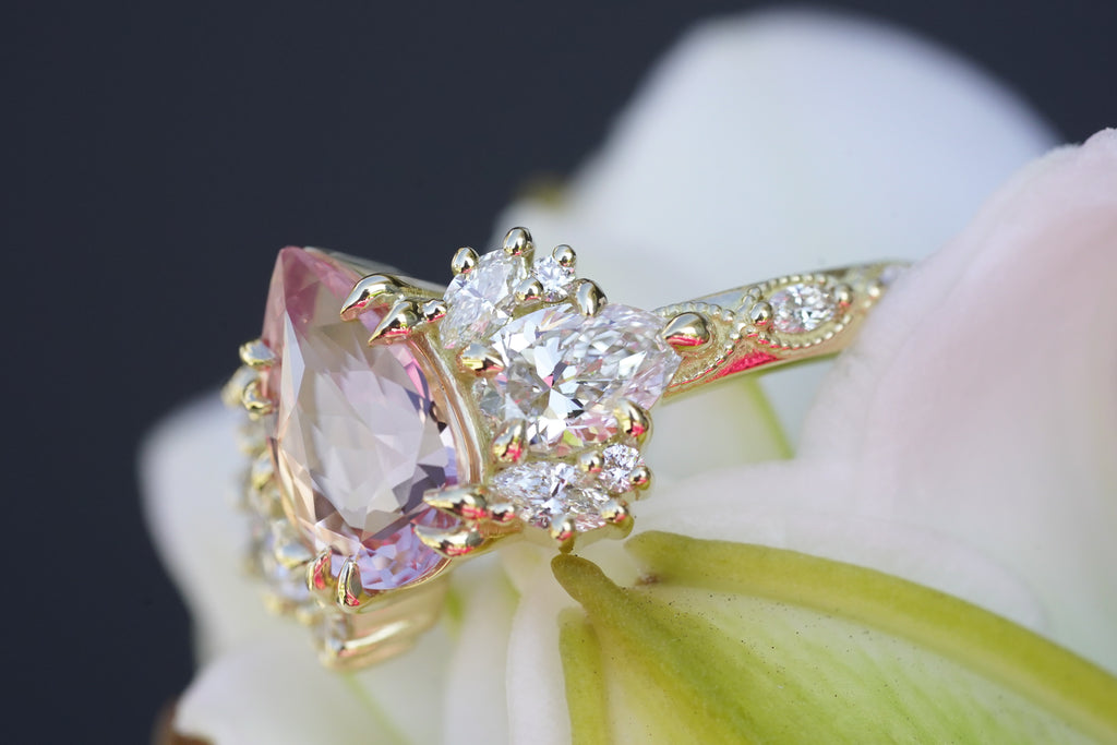 Arcadia engagement ring with padparadscha sapphire center stone