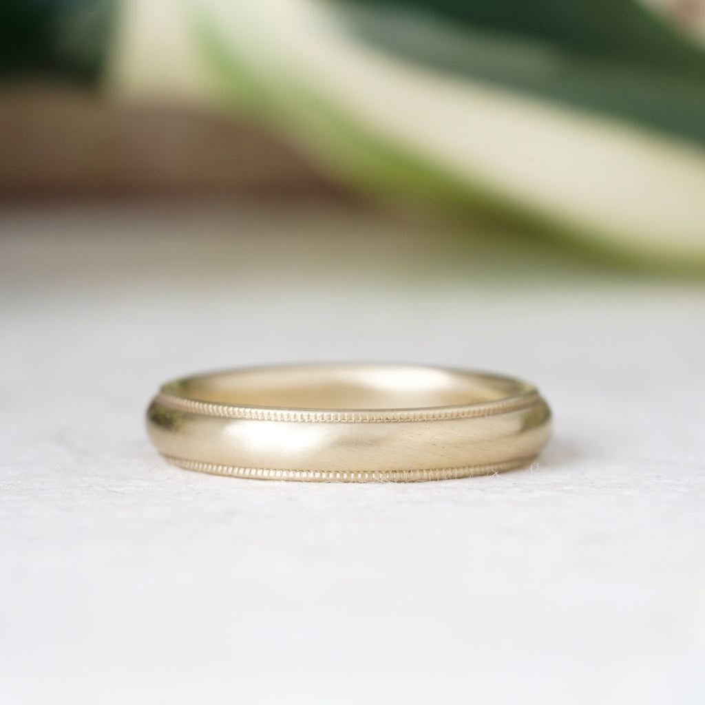 eco-friendly wedding band with milgrain detailing