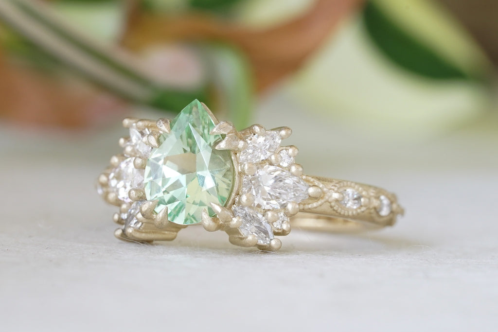 Handcrafted gold engagement ring setting for small pear gemstones