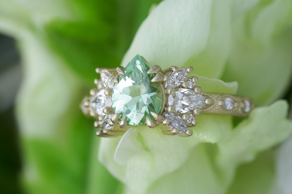 Arcadia setting with petite pear-shaped center stone setting