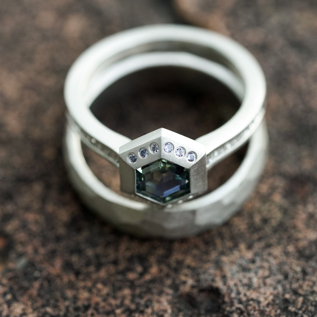 architectural solitaire ring with bezel set gemstone