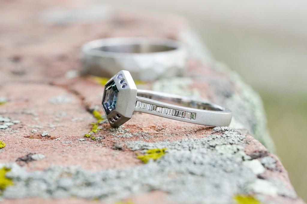 architectural solitaire ring with bezel set gemstone