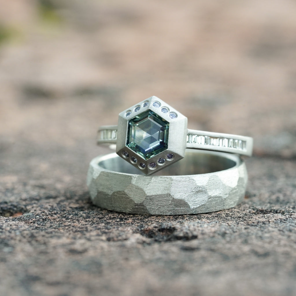 architectural solitaire ring with bezel set gemstone