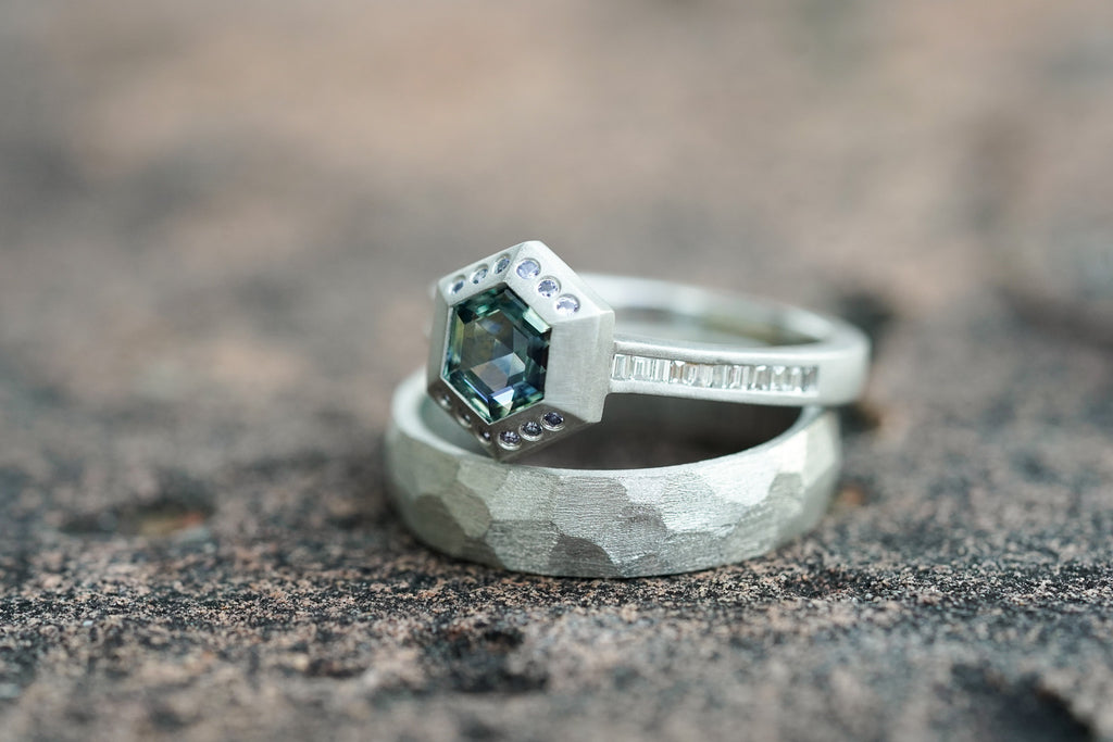 architectural solitaire ring with bezel set gemstone