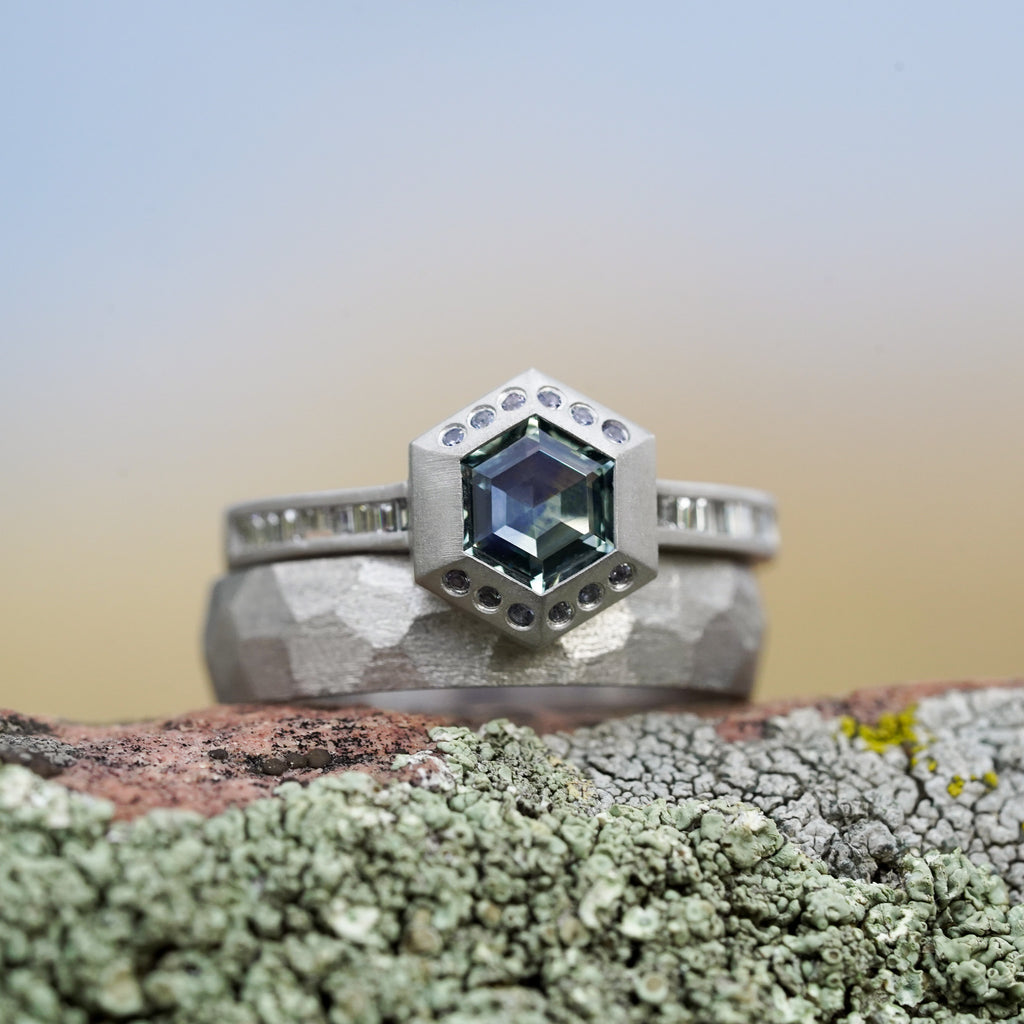 Yogo sapphire thick walled bezel surrounding a hexagon Montana Sapphire