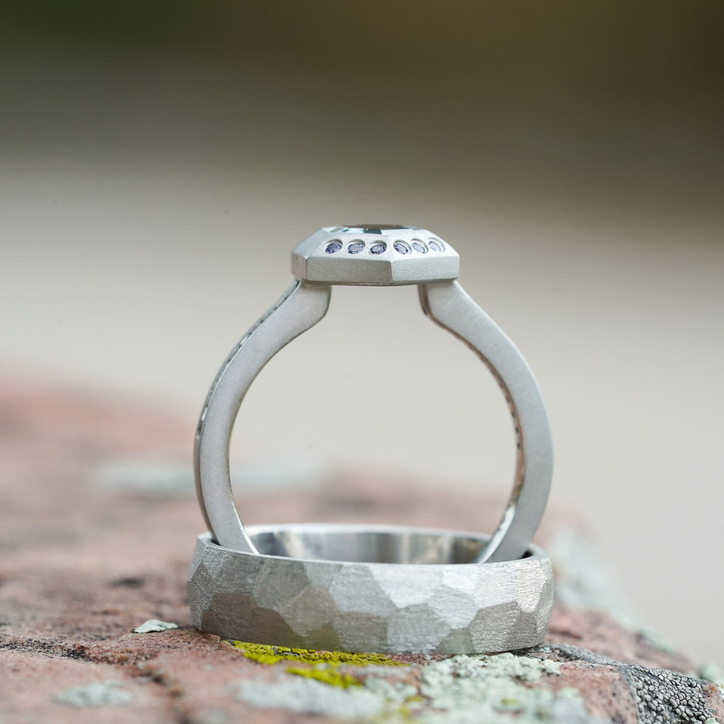 geometric engagement ring with hexagon Montana sapphire in platinum with a high profile