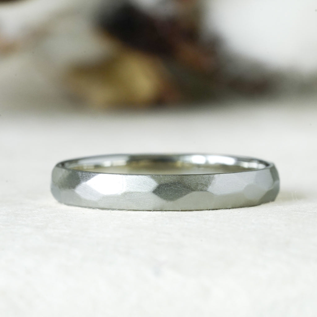 satin finish thin gold wedding band with hand-carved facets