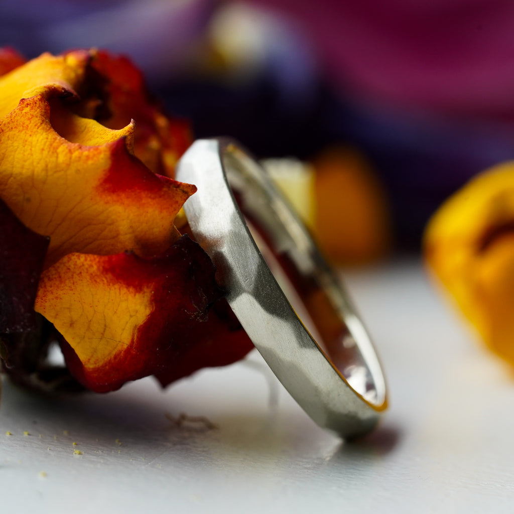 satin finish thin gold wedding band with hand-carved facets