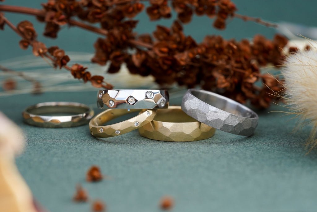 architecture inspired wedding collection with flush set diamonds in gold and platinum