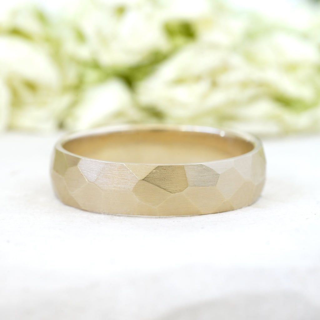 Faceted wedding band in 5mm width in 14k yellow gold satin finish