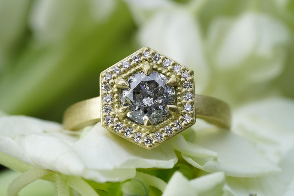 Matte finish gold engagement ring with natural diamonds