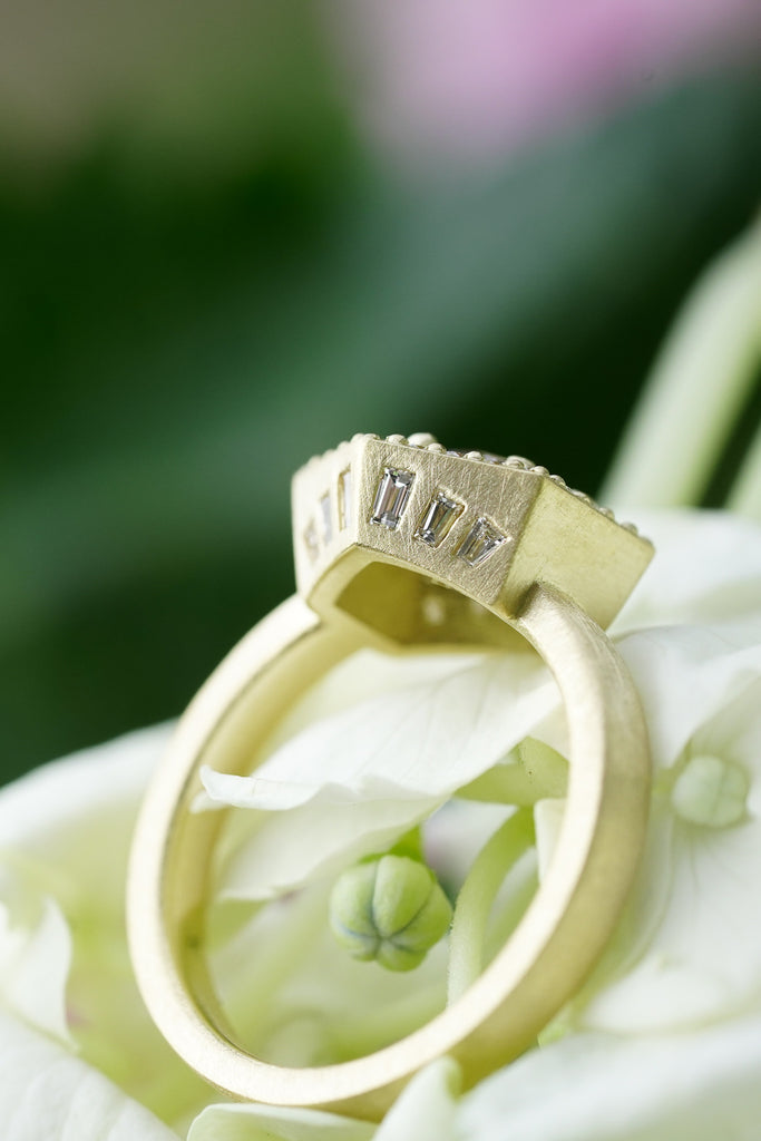 top down view of vintage engagement ring in 18k yellow gold with salt & pepper diamond