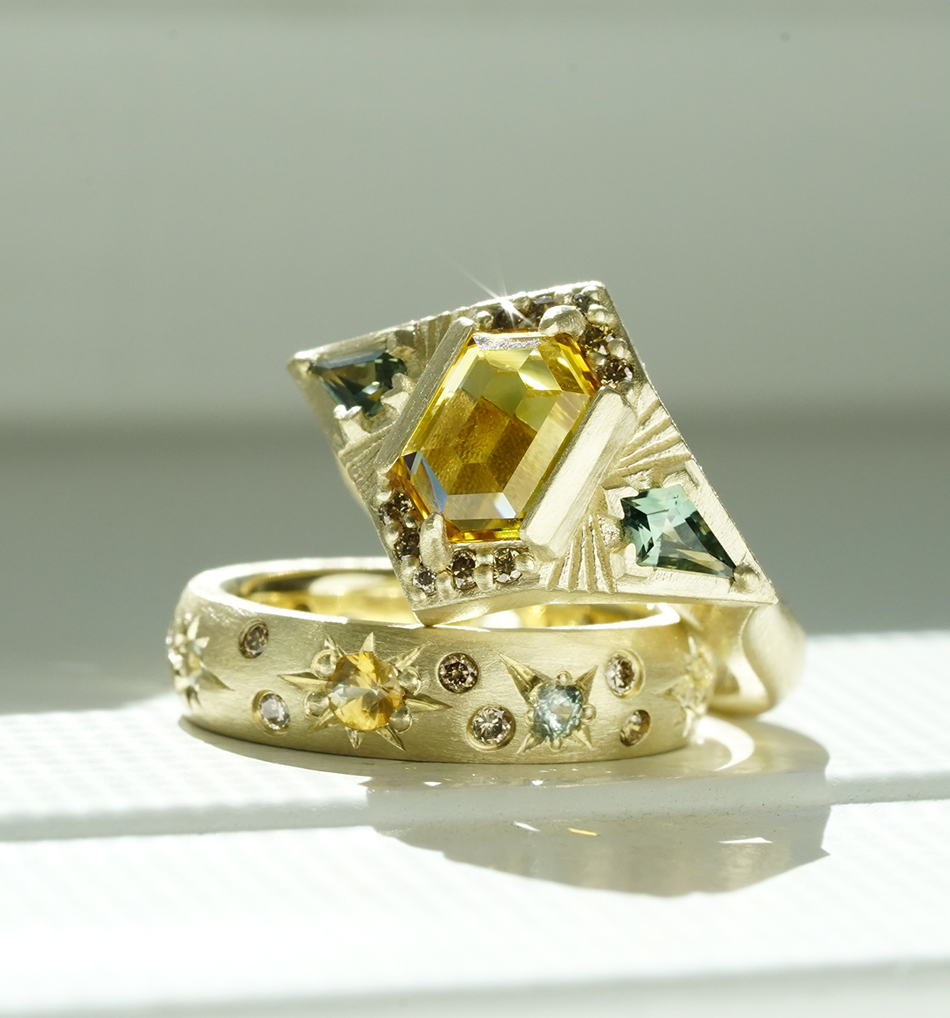 14k yellow gold sapphire Stellaris star set wedding band and yellow green sapphire celestial engagement ring