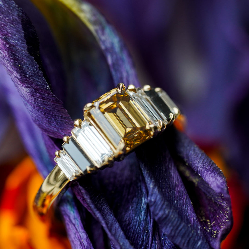 champagne emerald cut baguette engagement ring in 14k yellow gold