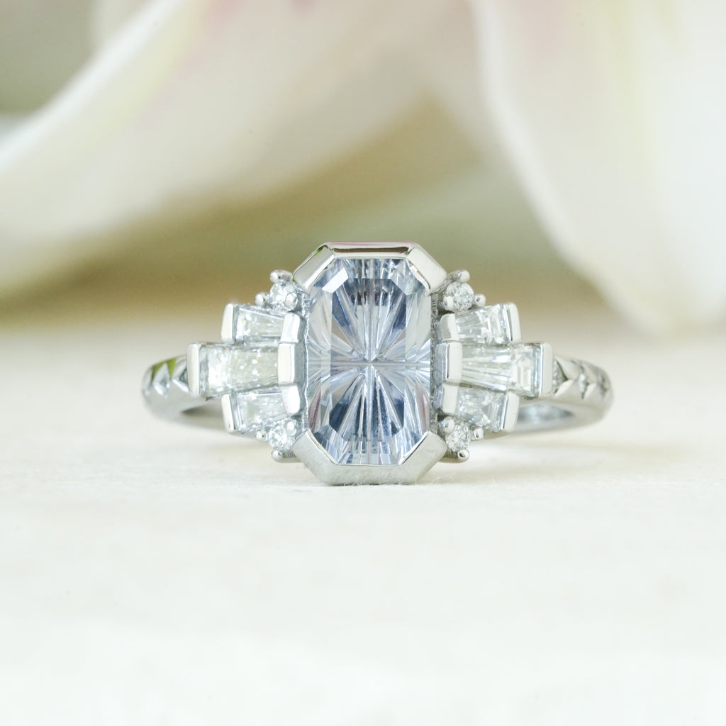 Art Deco platinum and sapphire engagement ring with diamonds