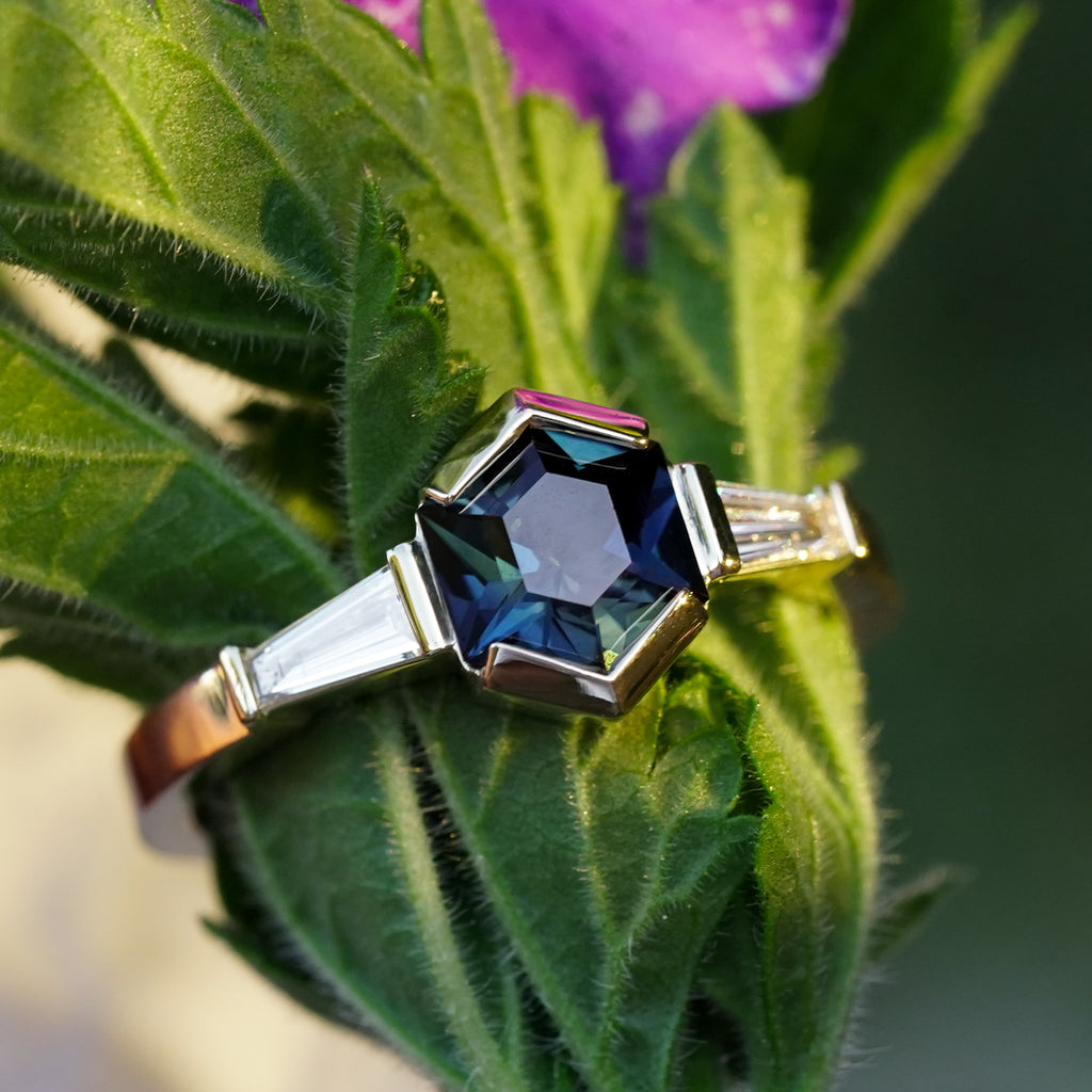 Hexagon Sapphire half bezel three stone engagement ring in 14k yellow gold