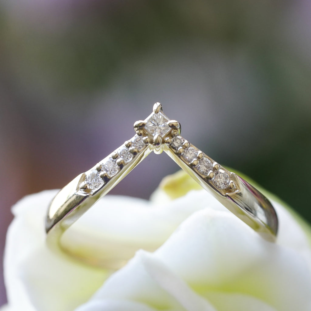 edgy low-profile engagement ring with celestial symbolism