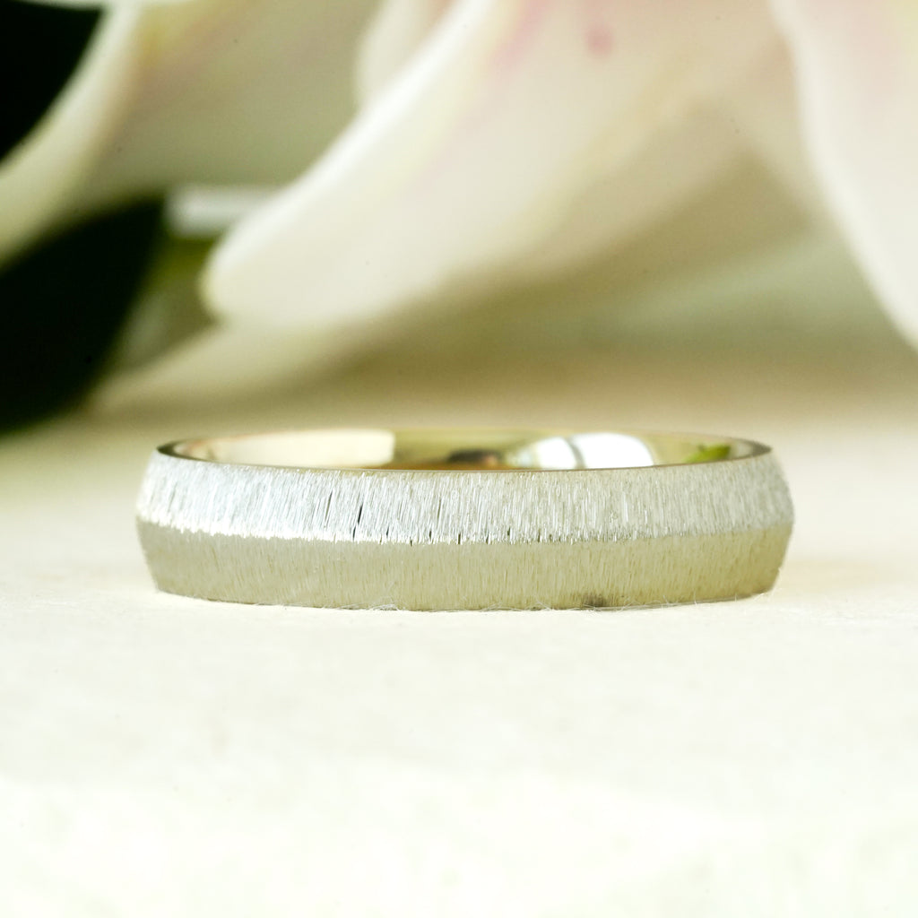 Nyx knife edge mens band in a brush texture in 14k yellow gold 