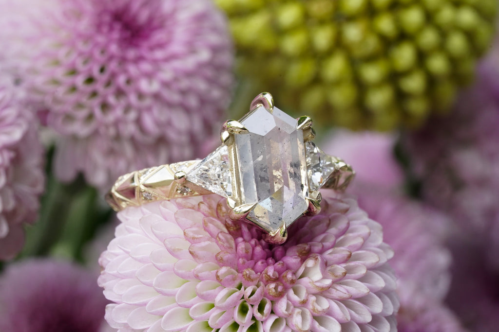 hexagon salt and pepper diamond with white triangle side stones