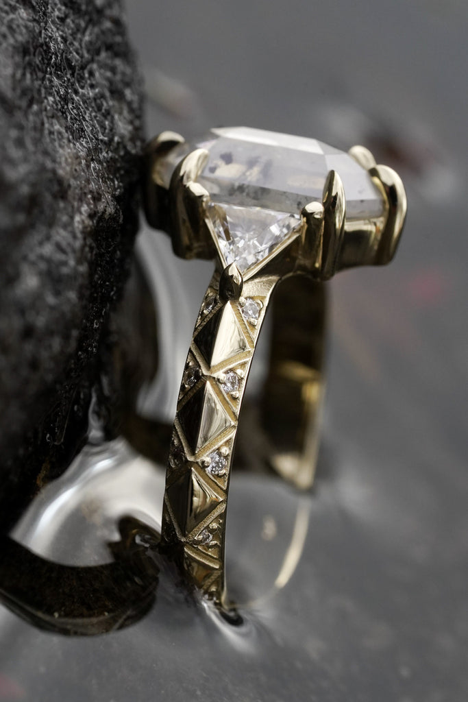 occult-inspired engagement ring in shiny 14k gold