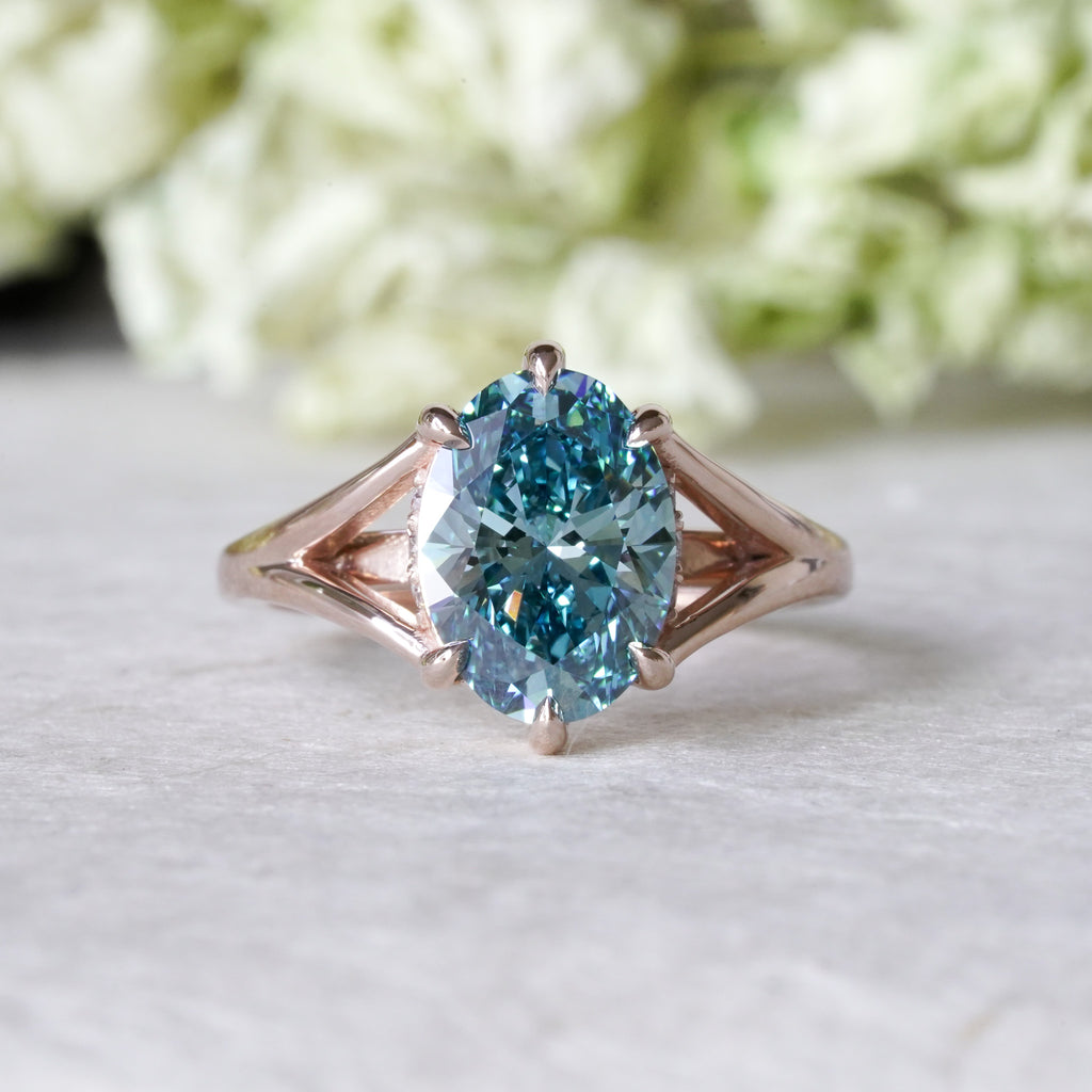 Classic solitaire engagement ring with split shank setting