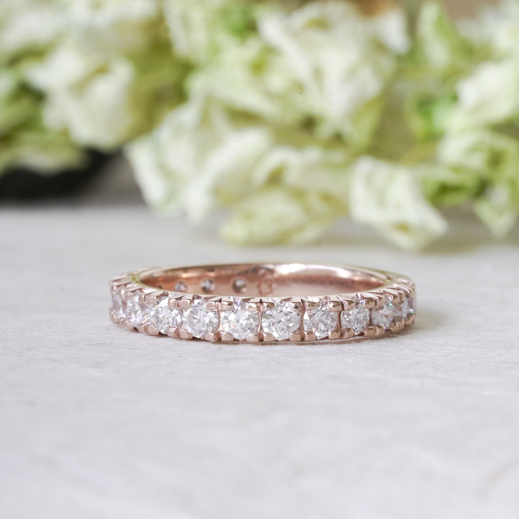 Olympia wedding band with french pavé diamonds in 14k rose gold