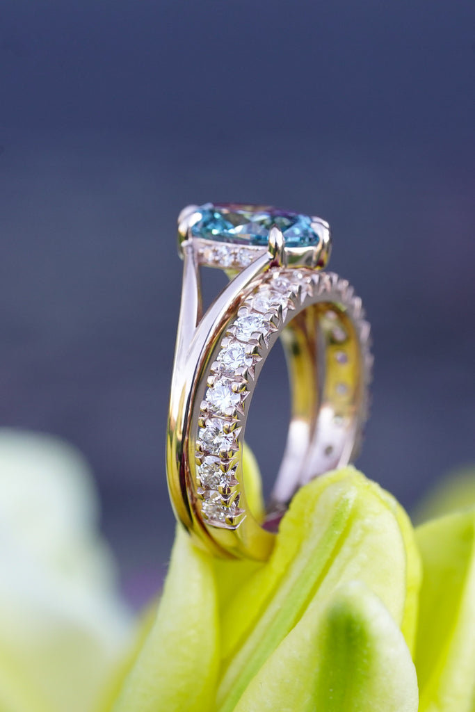 Close-up of prong set lab-grown diamond on recycled gold band