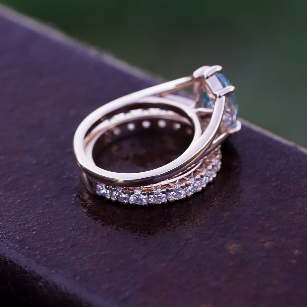 Side view of Grecian-inspired oval diamond engagement ring