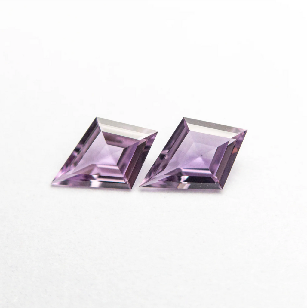 Match pair of purple sapphire kites