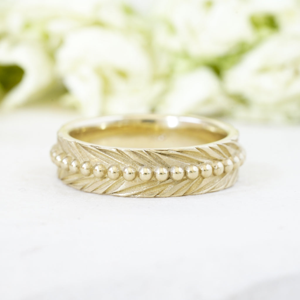 14k yellow gold feather wedding band 