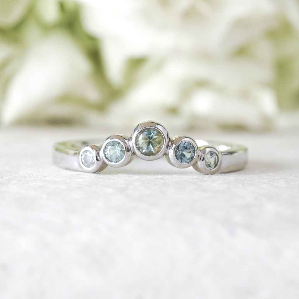 Round bezel montana sapphire contour wedding band 