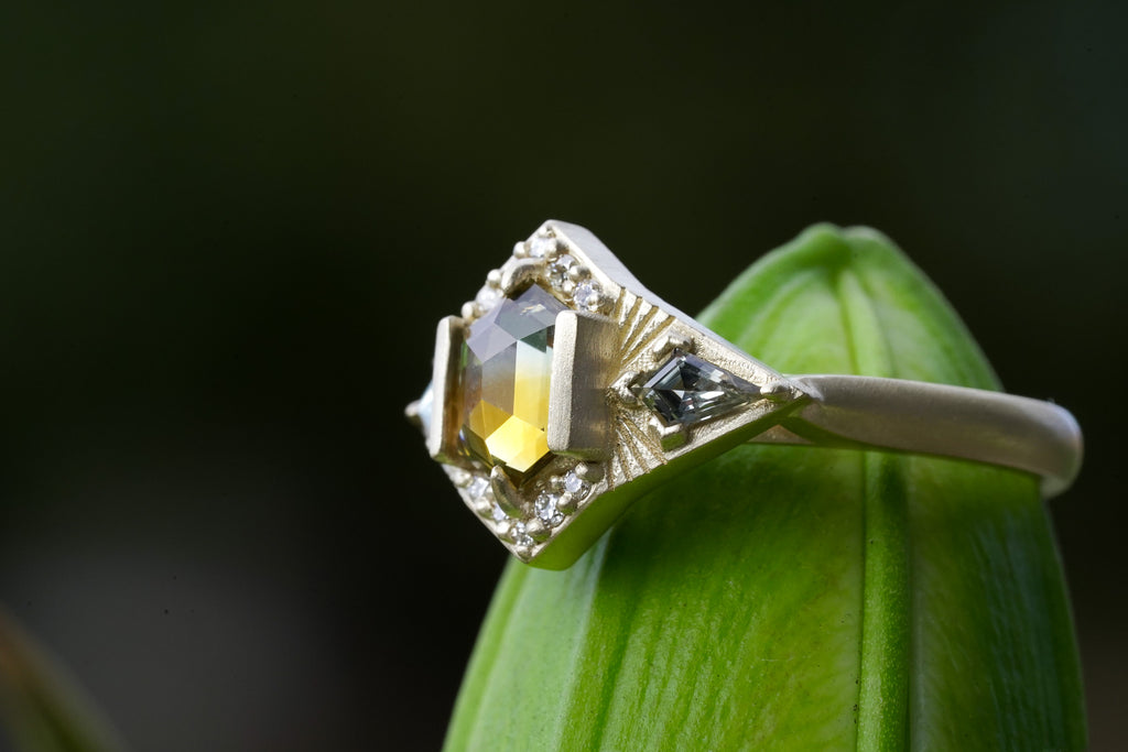 Starburst engagement ring with kite sapphires