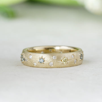 flush set celestial wedding band with diamonds and sapphires