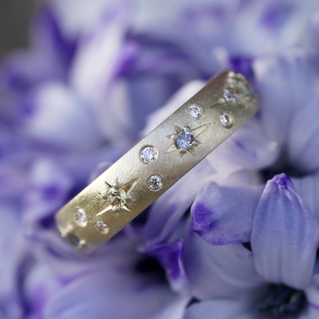 comet-inspired wedding band in gold