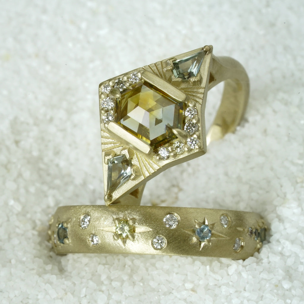 celestial and stars engagement ring with kite sapphires
