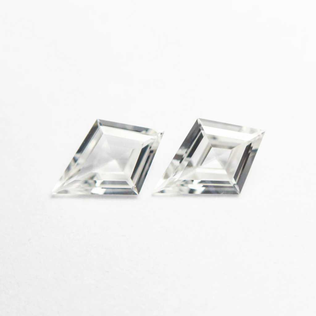 Match pair of white sapphire kites
