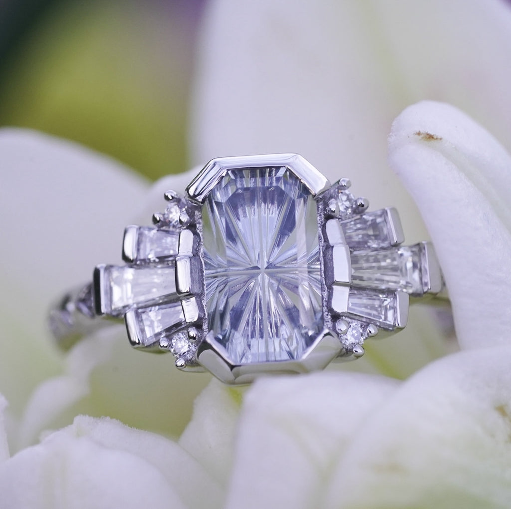 Art Deco engagement ring with sapphire and baguette diamonds