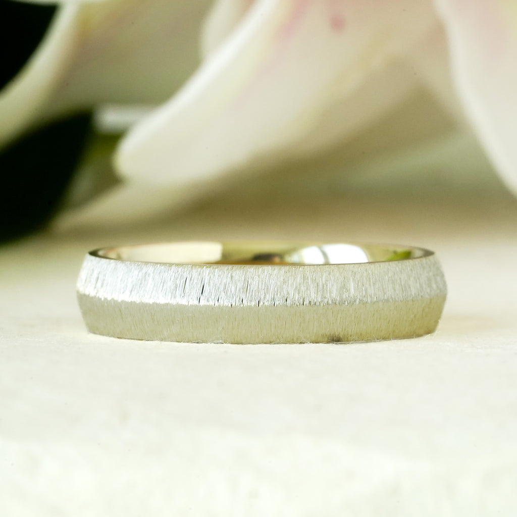 Knife edge men's band in 14k gold in a brushed finish